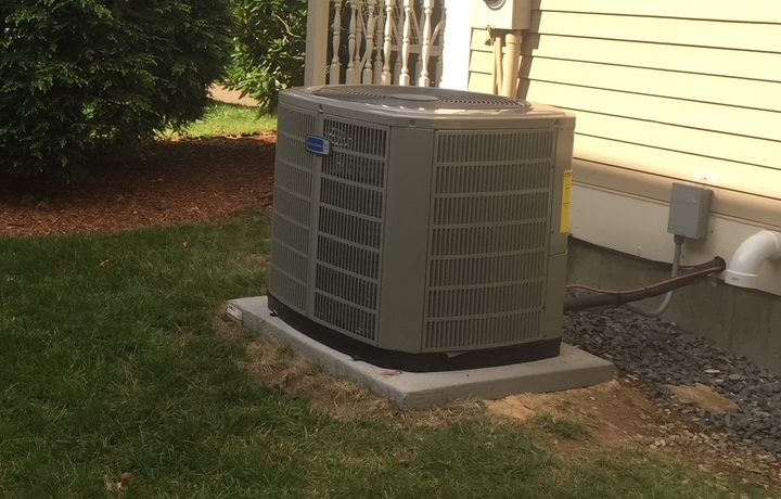 Central heat pump outdoor unit connected to a home's ducted HVAC system